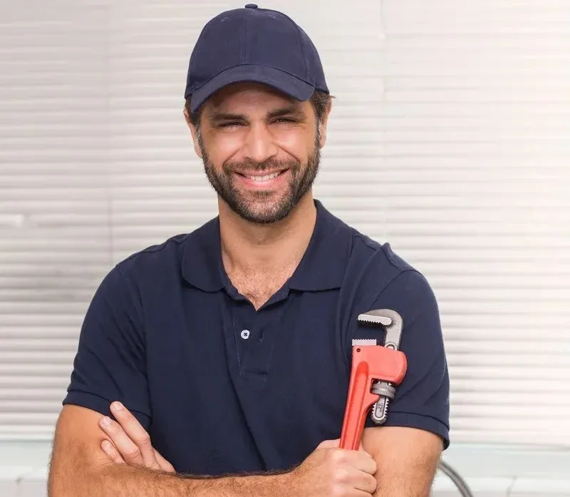 Professional plumber at work